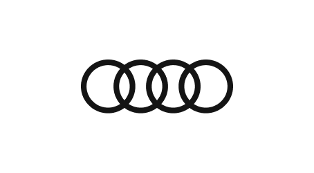 Symbole von vier ineinander verschlungenen Ringen, ein bekanntes automobillogobezogenes Design.