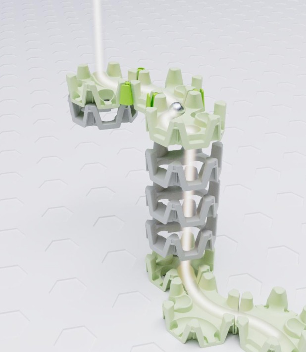 Kugelbahn mit spiralförmigem Turm und grünen Akzenten, zeigt eine Murmelbahn auf hexagonaler Platte.