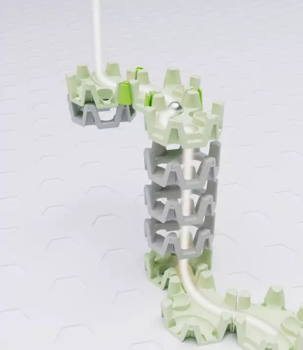 Kugelbahn mit spiralförmigem Turm und grünen Akzenten, zeigt eine Murmelbahn auf hexagonaler Platte.