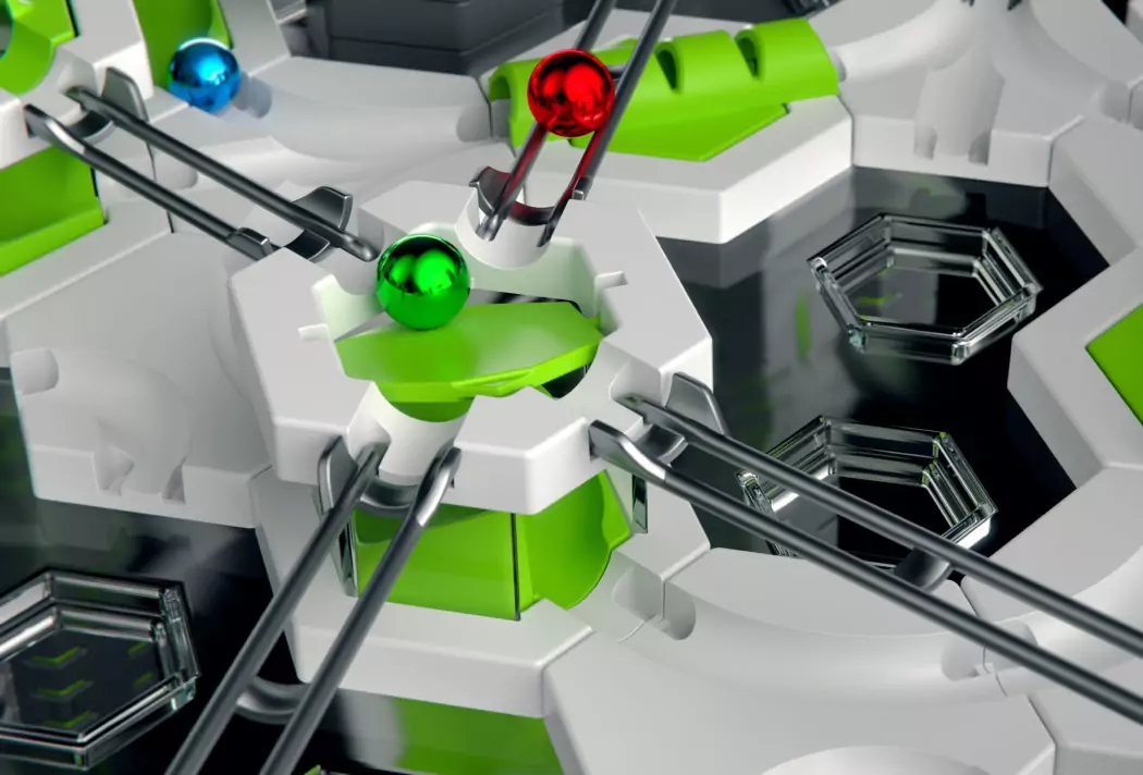 Futuristisches 3D-Darstellung von farbigen Kugeln und sechseckigen Formen in einem technologischen Muster.