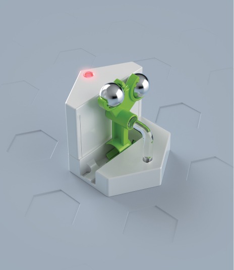 GraviTrax-makingOf-h356-3col-1 Futuristischer Wasserhahn mit grünem Hebel und silbernen Knöpfen, hexagonaler Hintergrund, modernes Design.