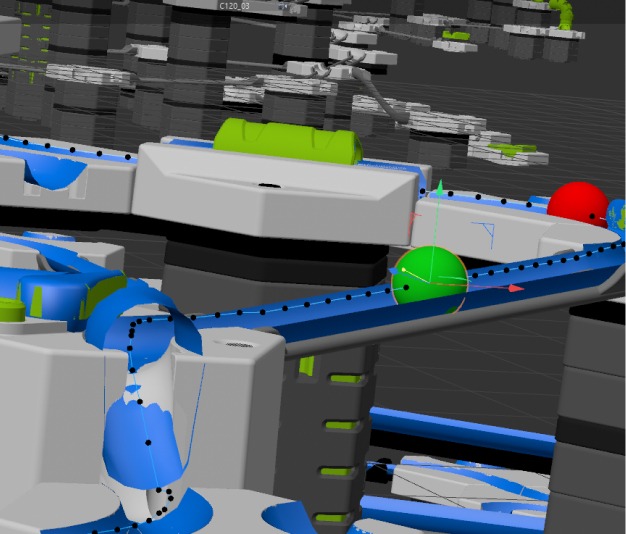 GraviTrax-makingOf-h356-4col 3D-Render einer Spielzeugkugelbahn mit bunten Kugeln auf einer blauen Strecke in industrieller Umgebung.